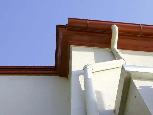 uPVC gutter and downpipe on a house